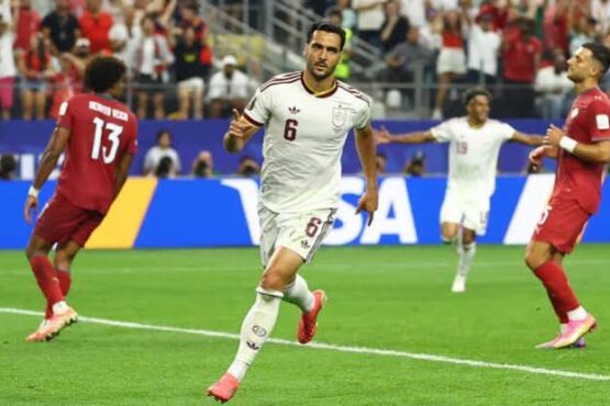 Spain players celebrate after scoring the winning goal against Portugal during the FIFA World Cup 2026 Round of 16 match.