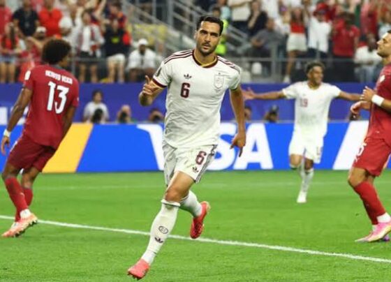Spain players celebrate after scoring the winning goal against Portugal during the FIFA World Cup 2026 Round of 16 match.